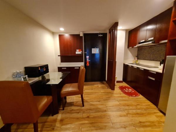 COZY Studio at Ming Garden Residence : photo 8 de la chambre chambre quadruple confort