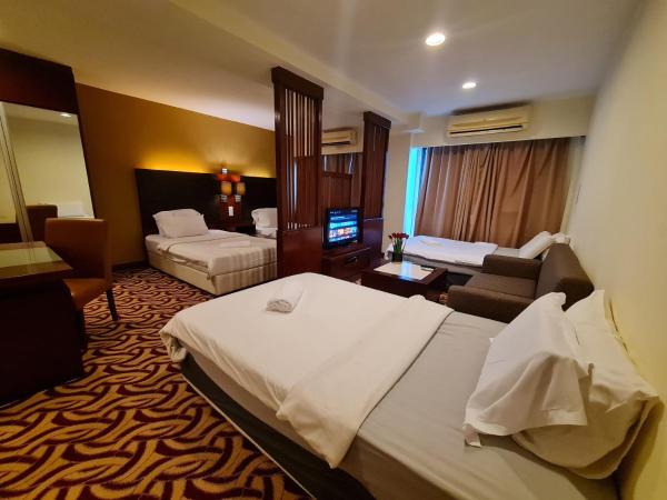 COZY Studio at Ming Garden Residence : photo 4 de la chambre chambre quadruple confort