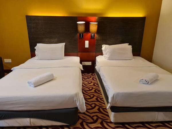 COZY Studio at Ming Garden Residence : photo 3 de la chambre chambre lits jumeaux avec douche 