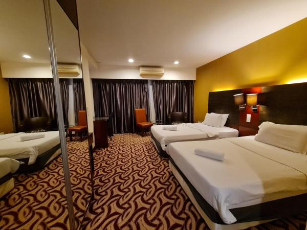 COZY Studio at Ming Garden Residence : photo 1 de la chambre chambre lits jumeaux avec douche 