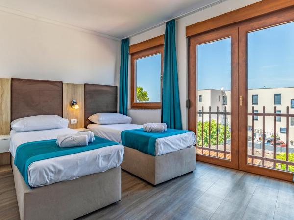 Hotel Koral : photo 2 de la chambre chambre quadruple