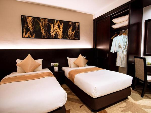 Amansari Residence Resort : photo 1 de la chambre chambre lits jumeaux