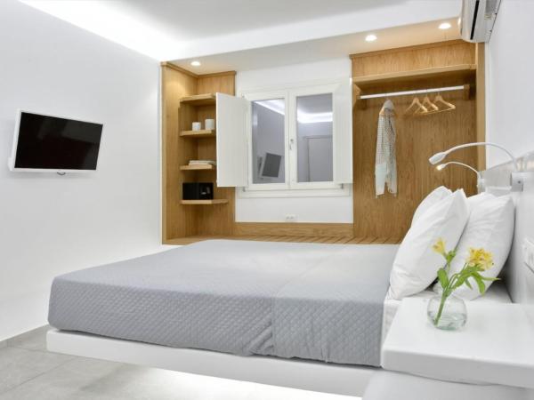 AC Village Christoulis : photo 5 de la chambre appartement - vue sur jardin