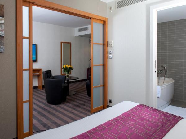 Brit Hotel Belfort Centre-Le Boreal : photo 1 de la chambre suite