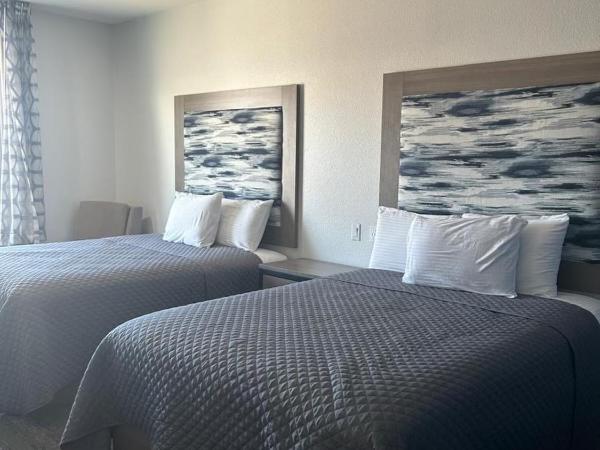 Express Inn - Richey : photo 4 de la chambre chambre lit queen-size - accessible aux personnes à mobilité réduite