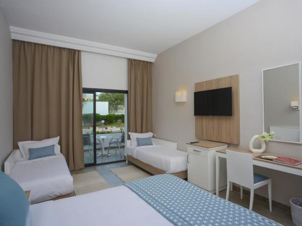 Nozha Beach Resort & Spa : photo 4 de la chambre chambre familiale standard (2 adultes + 2 enfants)