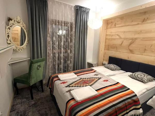 Chałpa z bali : photo 6 de la chambre chambre double avec salle de bains privative