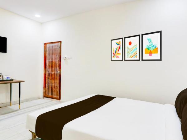 Super Collection O HOTEL SS BLUE INN : photo 2 de la chambre chambre triple classique