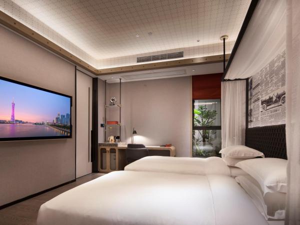 Arthur Hotel Zhujiang New Town Guangzhou- Free Shuttle Bus For Canton Fair : photo 5 de la chambre chambre double avec 2 lits doubles