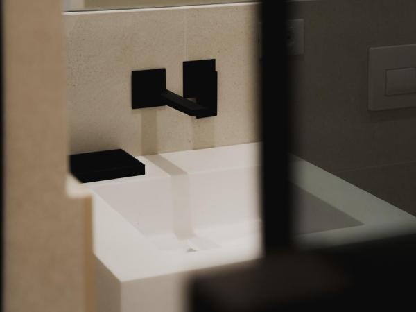 San Michele Luxury Rooms : photo 3 de la chambre chambre lit queen-size avec baignoire spa