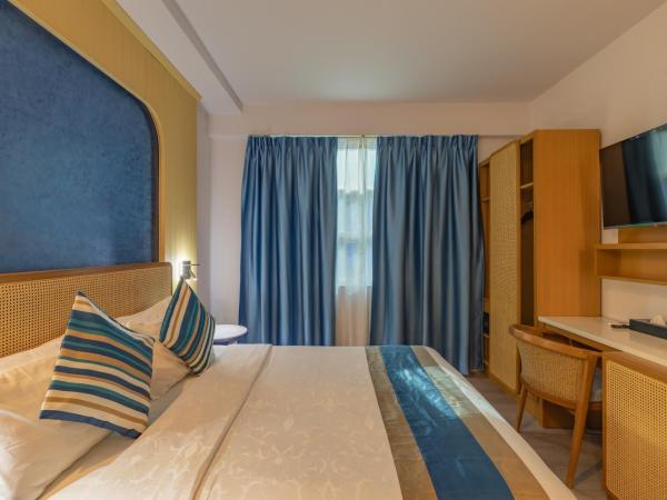 UMET Seaview Hotel with Free Roundtrip Airport Pick up and drop off : photo 1 de la chambre suite supérieure