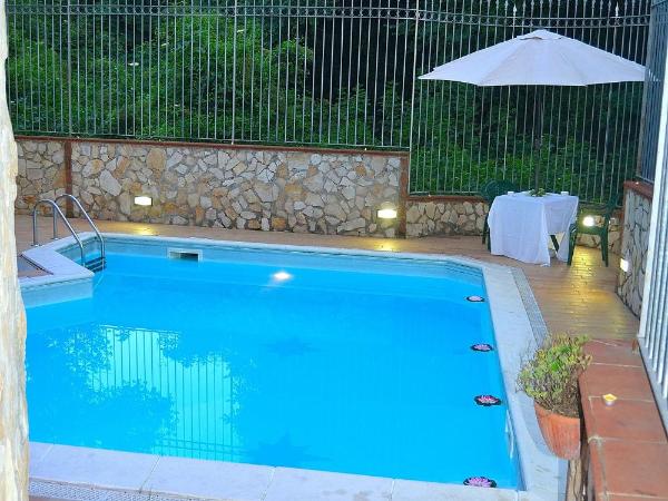 I Giardini di Capodimonte 2 : photo 1 de la chambre chambre quadruple - vue sur jardin