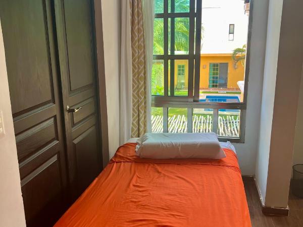 Cancun-Soho : photo 3 de la chambre suite lit queen-size - vue sur piscine