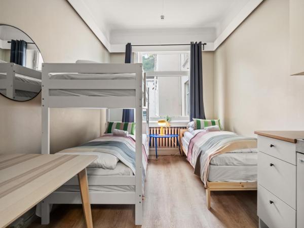 Budgetel- Kong Oscarsgate 22 : photo 9 de la chambre chambre triple standard