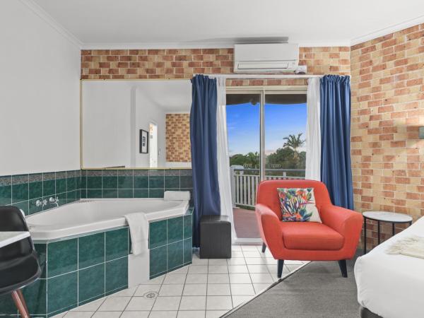 Airport Clayfield Motel : photo 2 de la chambre suite exécutive avec bain à remous
