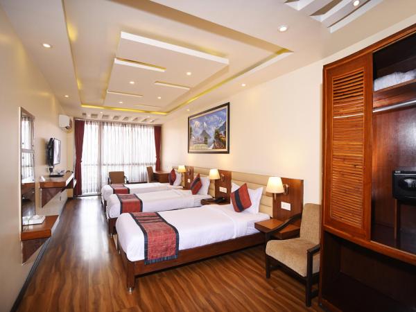 Hotel Jampa : photo 10 de la chambre chambre triple deluxe - navette aéroport aller ou retour gratuite