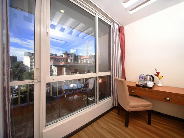 Hotel Jampa : photo 9 de la chambre chambre triple deluxe - navette aéroport aller ou retour gratuite