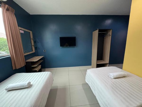 Hotel Pinji Ipoh : photo 2 de la chambre chambre lits jumeaux standard