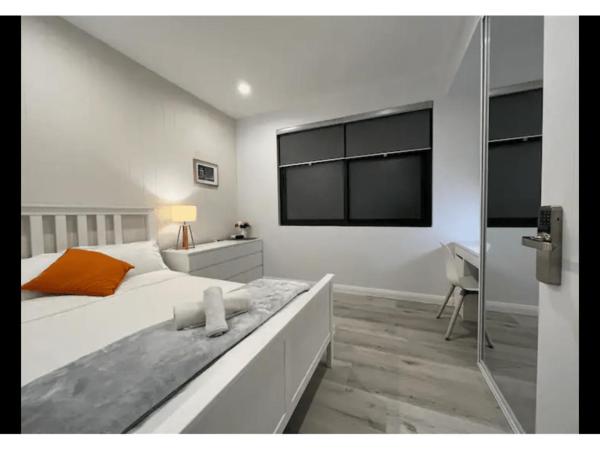 Macquarie Guest House : photo 1 de la chambre chambre simple avec salle de bains commune
