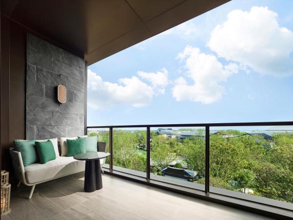 Garrya Yangcheng Lake : photo 8 de la chambre chambre lit king-size - vue sur jardin