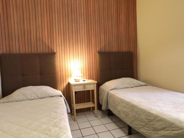 V Dinastia : photo 6 de la chambre chambre lits jumeaux verte - sans ménage