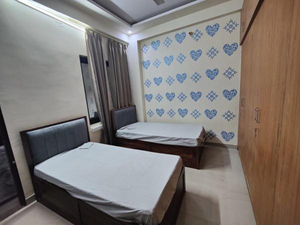 Nomadic Paying Guest : photo 9 de la chambre chambre lits jumeaux avec salle de bains privative