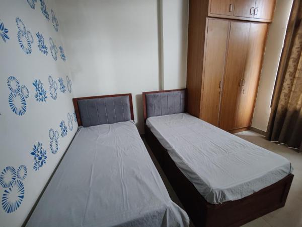 Nomadic Paying Guest : photo 10 de la chambre chambre lits jumeaux avec salle de bains privative