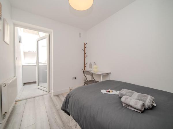 HarmonyNest Parkview Elegance : photo 7 de la chambre chambre lit queen-size deluxe