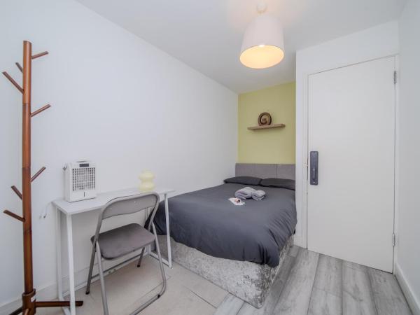 HarmonyNest Parkview Elegance : photo 4 de la chambre chambre lit queen-size deluxe