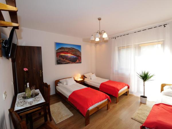 Willa Julia : photo 1 de la chambre chambre quadruple avec salle de bains privative