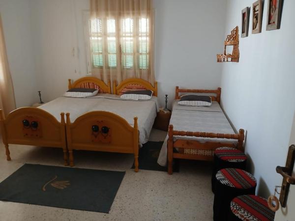 Dar Morjana : photo 2 de la chambre chambre quadruple - vue sur mer