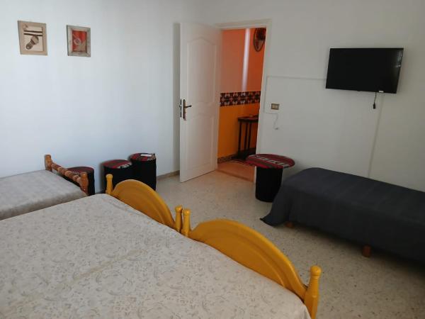 Dar Morjana : photo 3 de la chambre chambre quadruple - vue sur mer