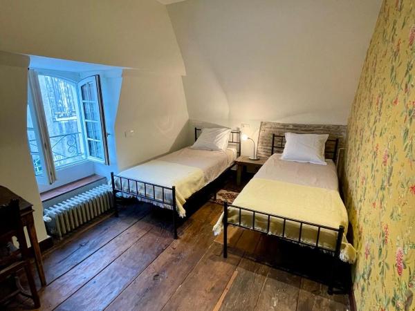 Jardin des Remparts : photo 3 de la chambre chambre lits jumeaux