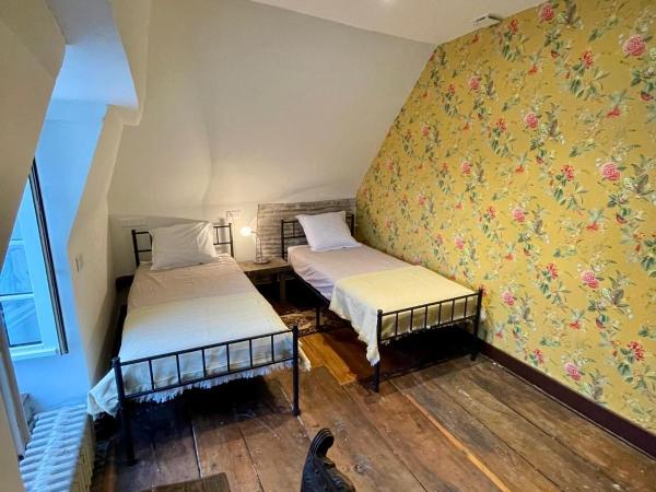 Jardin des Remparts : photo 5 de la chambre chambre lits jumeaux