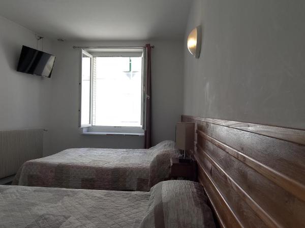 Hôtel des Jacobines : photo 1 de la chambre chambre triple