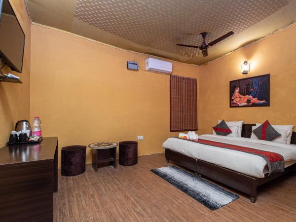 Arise Ethnic Village Resort : photo 2 de la chambre chambre double deluxe (2 adultes + 1 enfant)