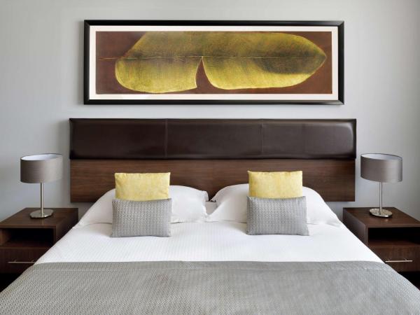 Mövenpick Hotel Apartments Al Mamzar Dubai : photo 1 de la chambre studio lit king-size deluxe
