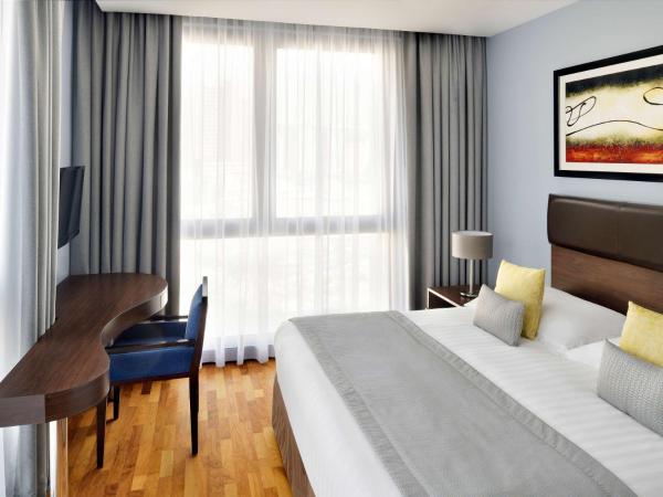 Mövenpick Hotel Apartments Al Mamzar Dubai : photo 2 de la chambre appartement 2 chambres