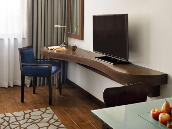 Mövenpick Hotel Apartments Al Mamzar Dubai : photo 3 de la chambre chambre lits jumeaux deluxe