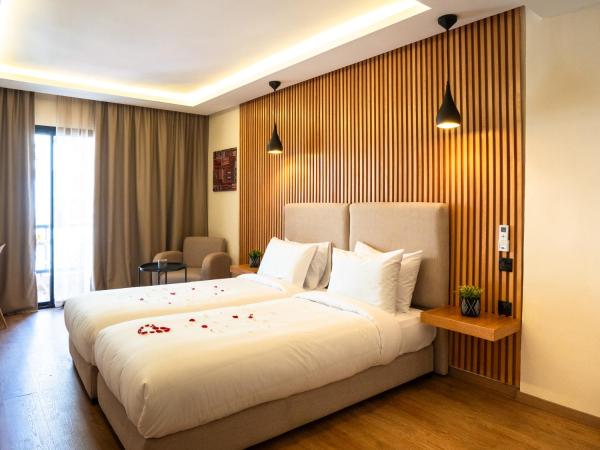 Unico Hotel Maarif : photo 3 de la chambre chambre lits jumeaux avec balcon