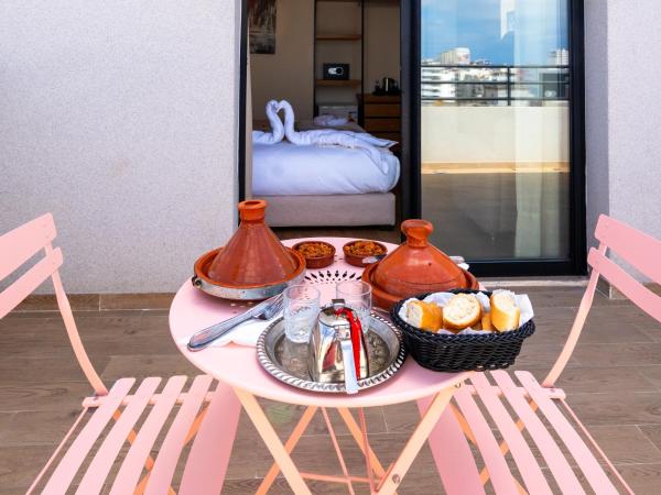 Unico Hotel Maarif : photo 9 de la chambre chambre lits jumeaux avec balcon