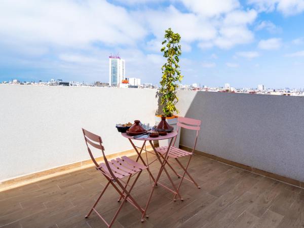 Unico Hotel Maarif : photo 10 de la chambre chambre lits jumeaux avec balcon
