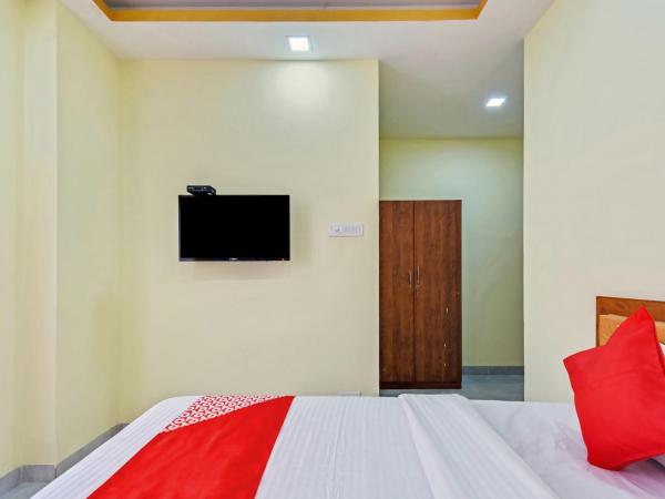OYO 74825 Om Shanti Palace : photo 8 de la chambre chambre triple classique