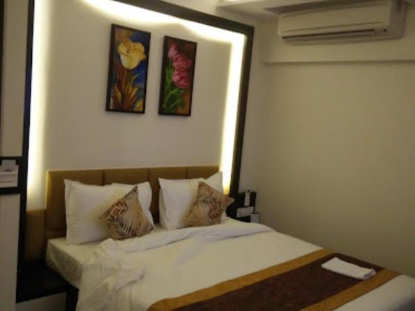 Hotel White Cloud Ahmedabad : photo 1 de la chambre chambre lit king-size deluxe