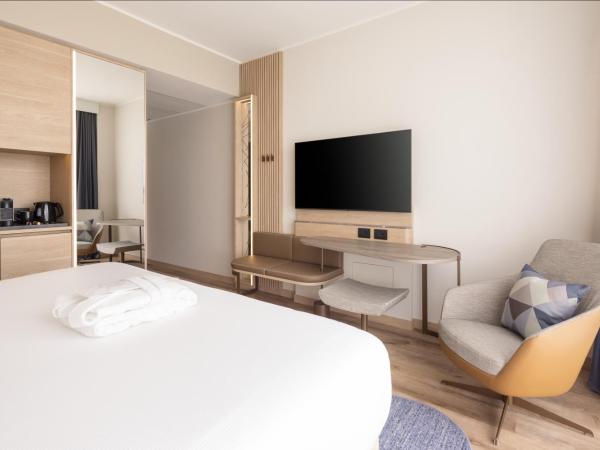 Courtyard by Marriott Milano Linate : photo 2 de la chambre chambre lit king-size deluxe - Étage