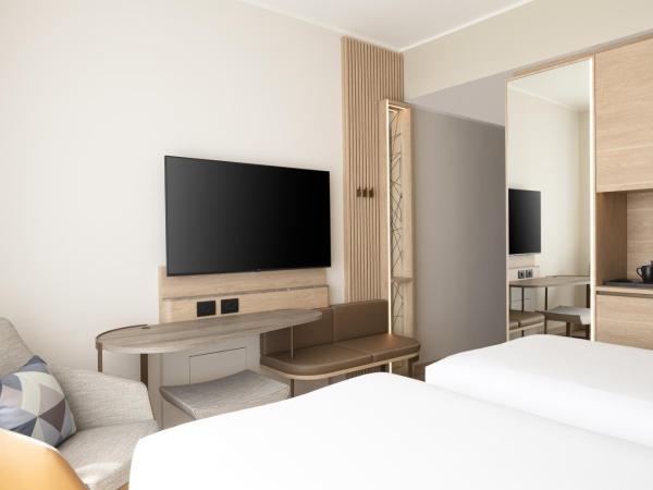 Courtyard by Marriott Milano Linate : photo 5 de la chambre chambre lits jumeaux standard