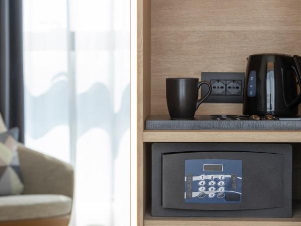 Courtyard by Marriott Milano Linate : photo 4 de la chambre chambre lit king-size deluxe - Étage