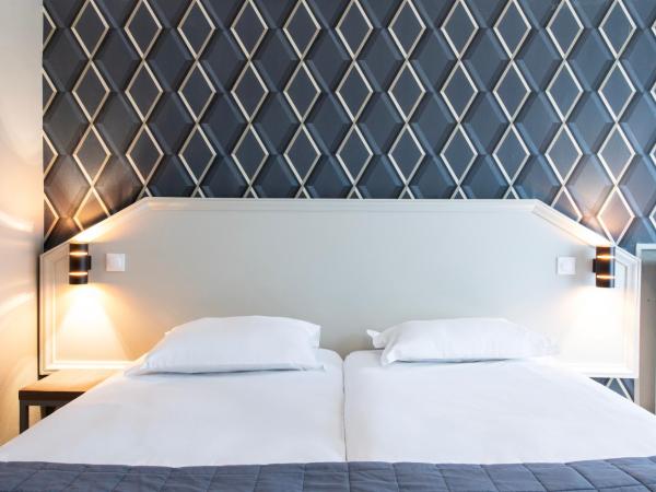 Hôtel Ambassadeur : photo 4 de la chambre chambre lits jumeaux supérieure