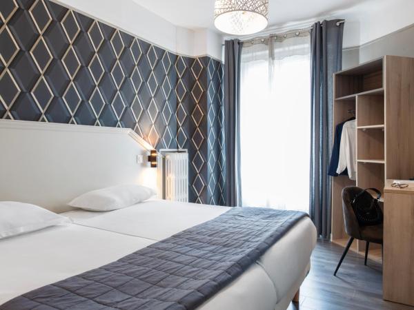 Hôtel Ambassadeur : photo 3 de la chambre chambre lits jumeaux supérieure