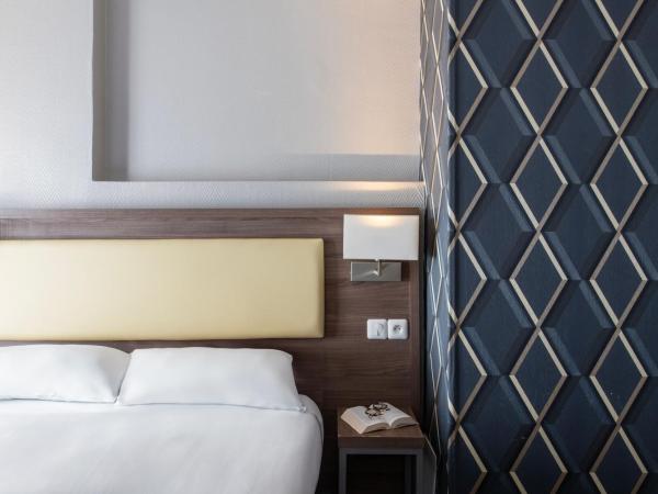 Hôtel Ambassadeur : photo 2 de la chambre chambre double